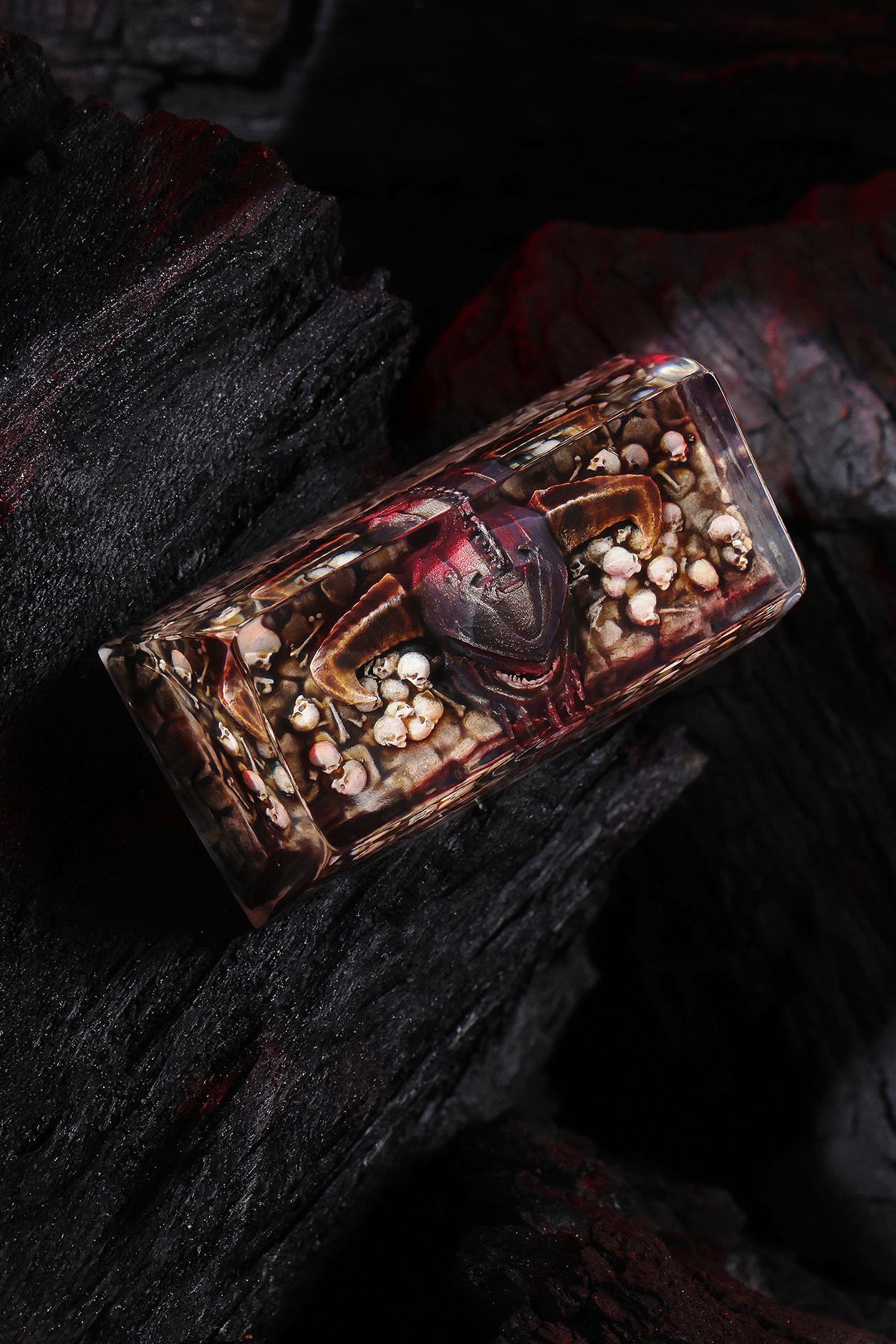 Decorative box with a red and white pattern on a dark background