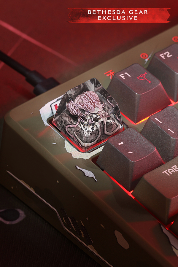 Close-up of a keyboard with a unique key featuring a brain design, labeled 'Bethesda Gear Exclusive'.