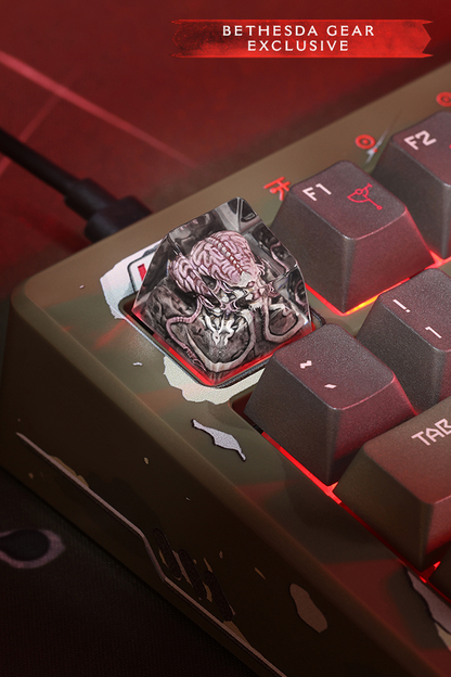 Close-up of a keyboard with a unique key featuring a brain design, labeled 'Bethesda Gear Exclusive'.