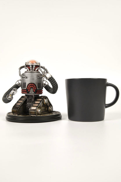 Image: Fallout Robobrain Statue next to coffee mug for scale