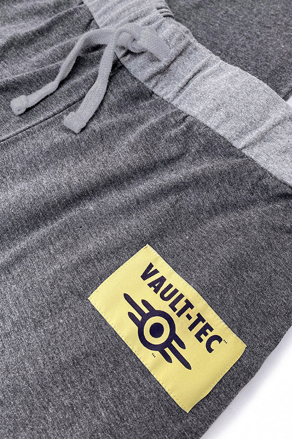 Image: Fallout Vault Lounger Pajama Set closeup of vault tec logo