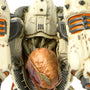 Close-up shot of the DOOM Eternal Revenant Statue, showing the details of its head and shoulders from above