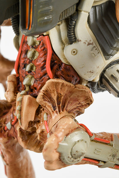 Close-up shot of the DOOM Eternal Revenant Statue, showing the details of the demon’s lower back and pelvis, taken from the side.