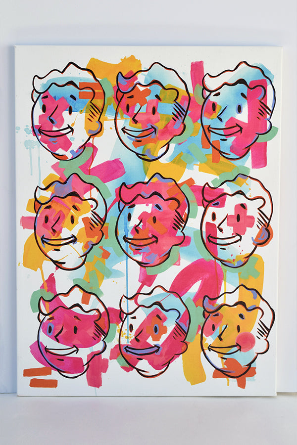 The Fallout Vault Boy Pop Art Canvas Print, an 18” x 24” artwork printed on canvas then stretched over a wooden frame. It features 9 of the same line art Vault Boy heads on a 3x3 grid. In the background are strokes of yellow, blue, green, and pink—painting each Vault Boy face with a different pattern on a white background
