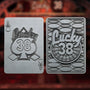 Front and back of the Lucky 38 metal Ace of Spades card, showing the embossed Lucky 38 ace of spades logo and the Lucky 38 Roulette logo, respectively.