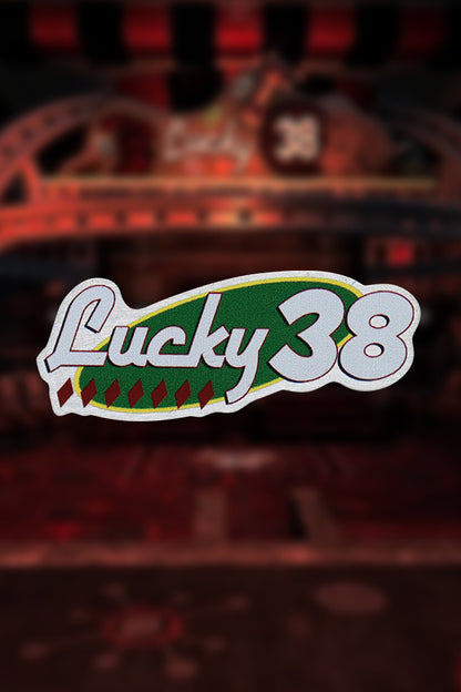 Front of the Lucky 38 metal pin badge.