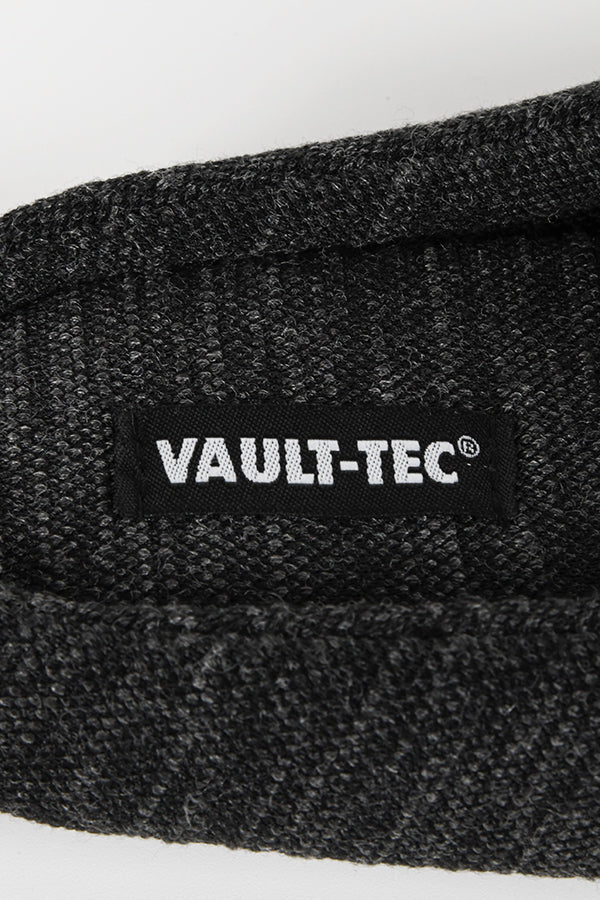 Image: Fallout Vault Tec Slippers closeup of tag