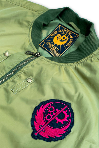 Image: Fallout Brotherhood of Steel Bomber Jacket closeup of front logo and tag