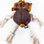 Overhead shot of the Fallout NCR Bear Pet Chew Toy, an 8.25” long dog toy feat. two heads (each with a squeaker), four rope legs, and an embroidered red New California Republic star on its backside.